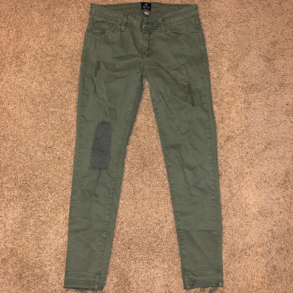 Green ripped jeans